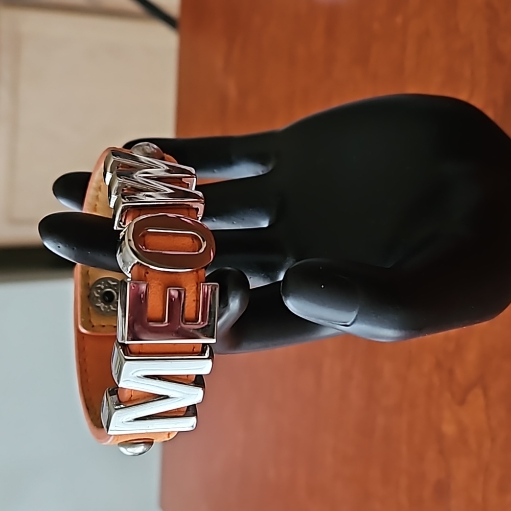 BCBG "MEOW" on Orange Leathery Bracelet